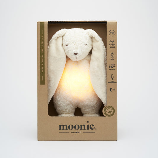 Peluche Moonie lapin blanc polaire, compagnon apaisant pour le sommeil de bébé et les nuits sereines.
