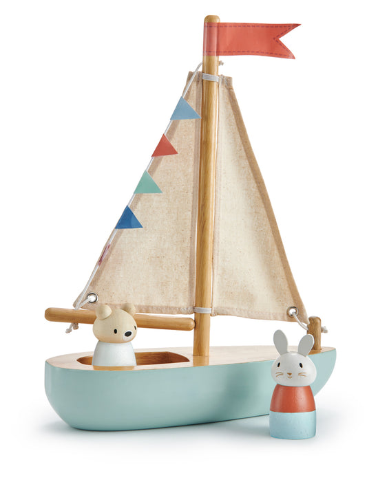 Voilier en bois, jouet en bois à partir de 3 ans. Pour jouer, développer l'imaginaire de votre enfant dès 3 ans et décorer sa chambre. Bateau en bois, voile et fanions en tissus. Personnages en bois.