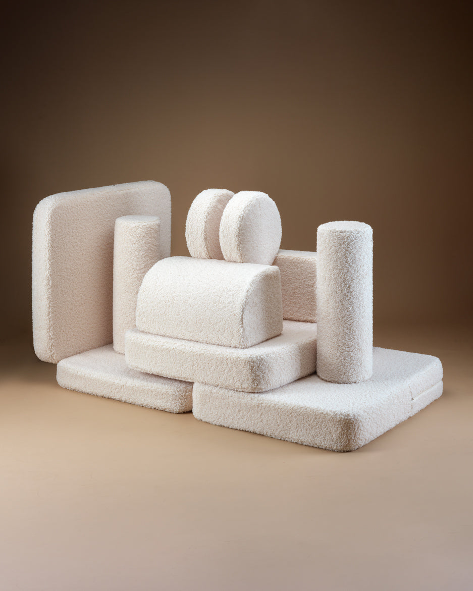 Canapé enfant beige modulable en forteresse ou bateau. Wigiwama