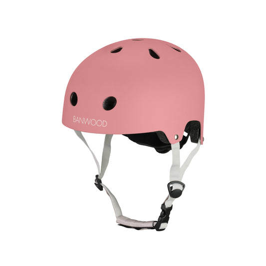 Casque vélo enfant ajustable Banwood assorti gamme Eco. Rose framboise.