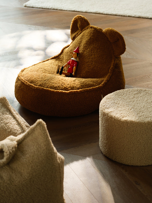Idée cadeau de noel original pour créer un coin lecture ou décorer une chambre d'enfant avec un joli fauteuil enfant en moumoute. Wigiwama