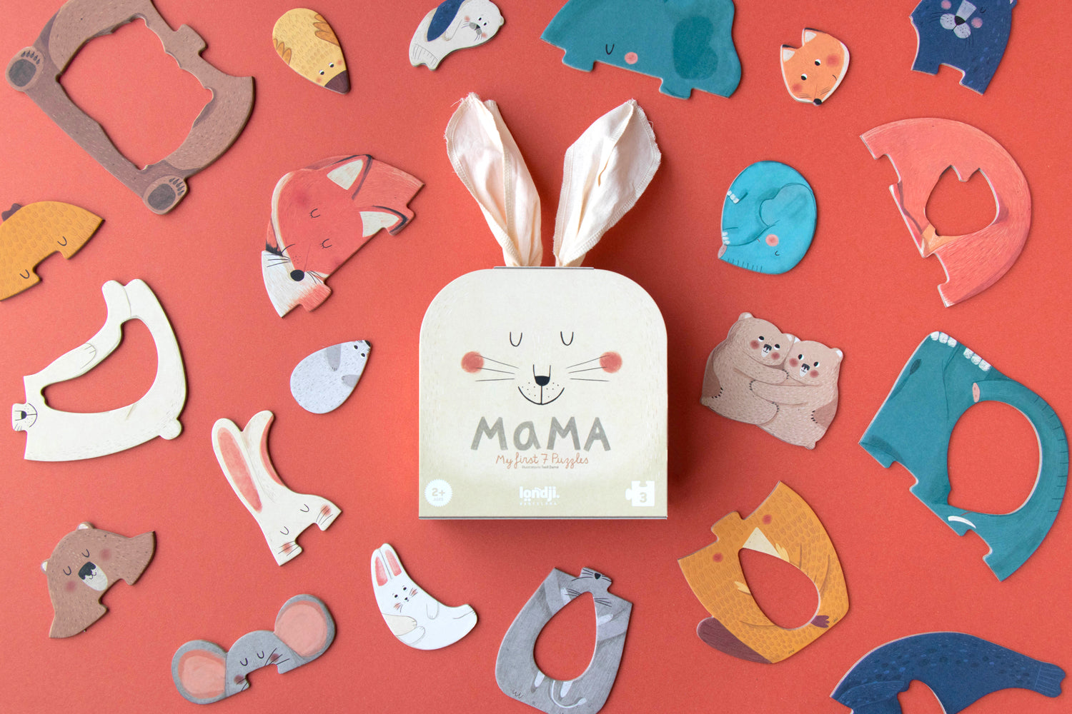 Coffret de 7 puzzles à encastrer Mama Londji. Puzzles de 3 pièces chacun représentant maman et bébé renard, maman et bébé lapin, maman et bébé éléphant etc.