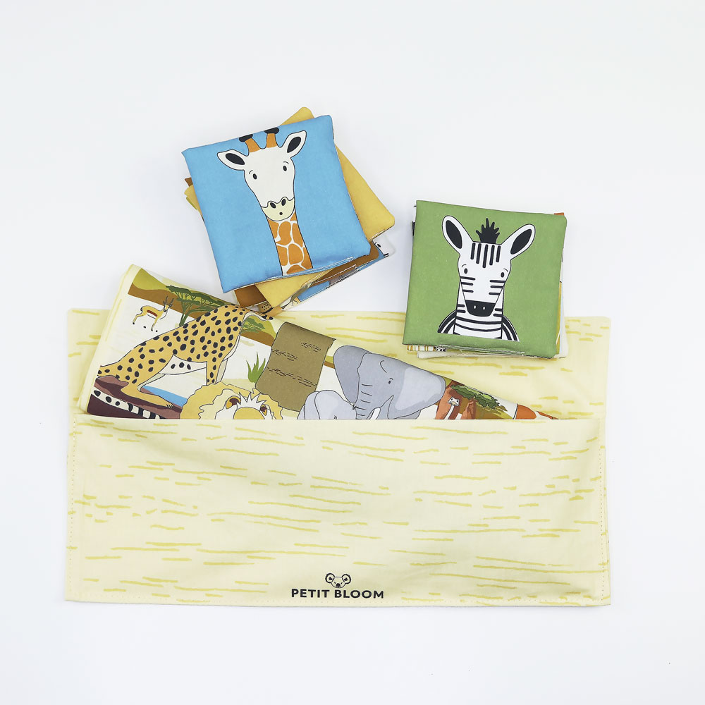 Puzzle de voyage pour bébé dès 2 ans. Pratique à emporter en voyage grace à son pochon en coton. Léger, souple. Se glisse facilement dans le sac. 