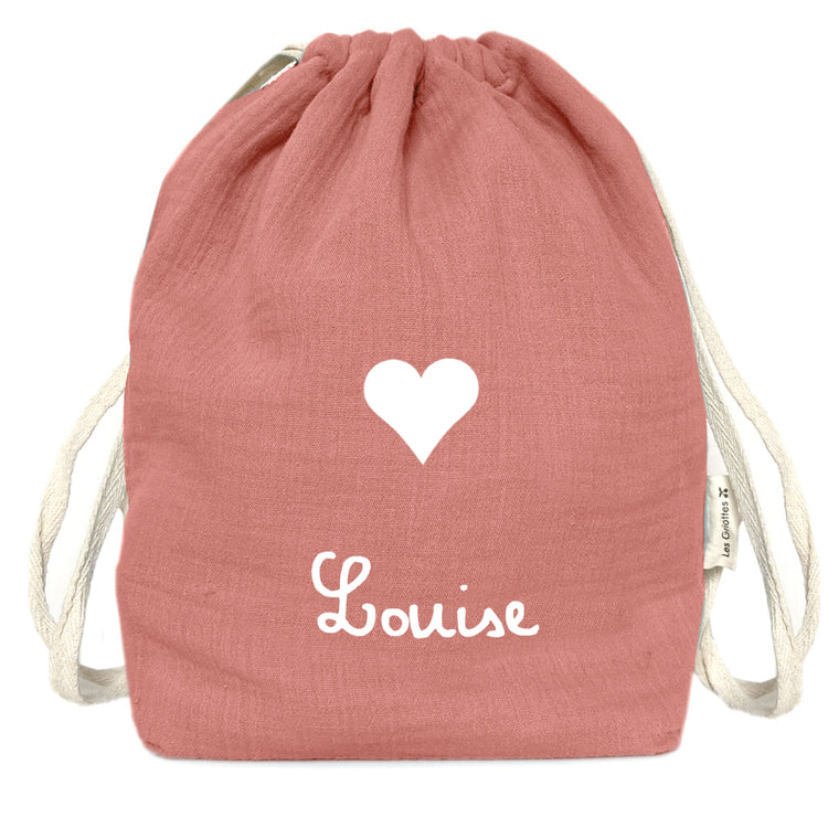 Sac à dos bébé fille personnalisé rose avec prénom Louise et motif cœur blanc