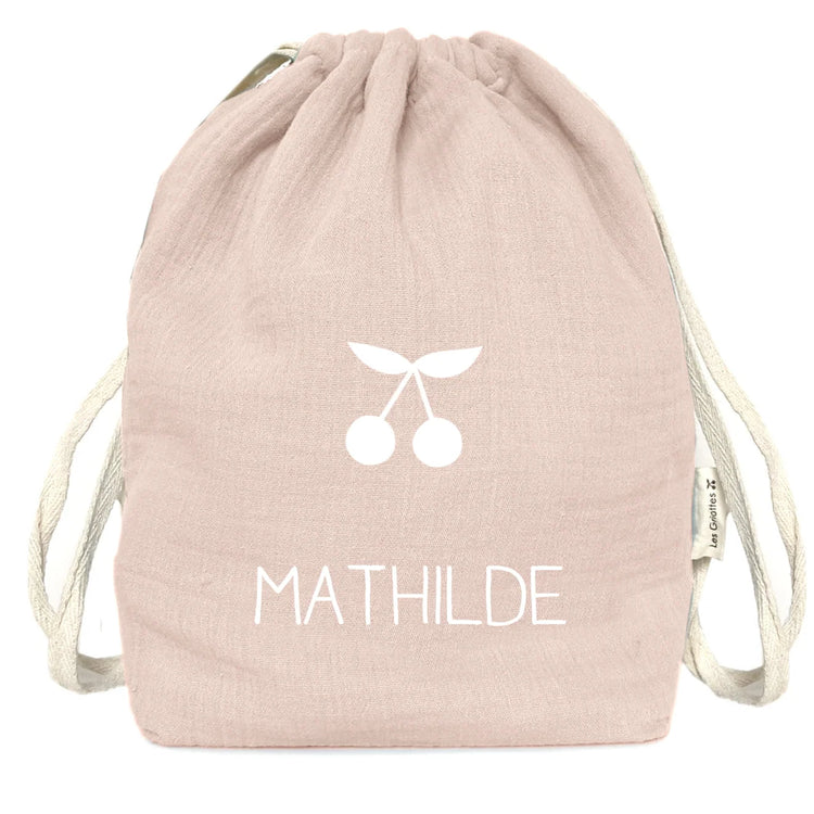 Sac bébé rose poudré personnalisé avec le prénom Mathilde et un motif cerises