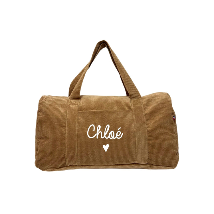 Sac week-end bébé personnalisé en velours marron clair, ambiance automne.