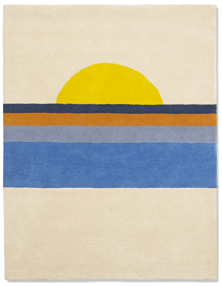 Tapis de chambre bébé sain, en coton bio. Coucher de soleil, jaune oranger et bleu sur fond beige.