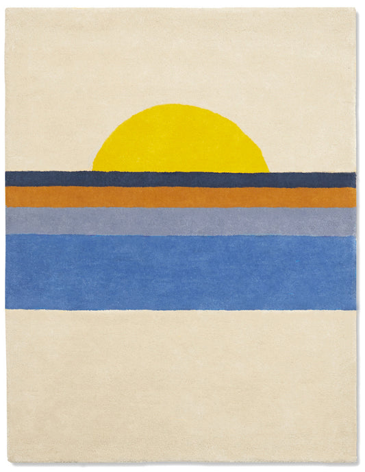 Tapis de chambre bébé sain, en coton bio. Coucher de soleil, jaune oranger et bleu sur fond beige.